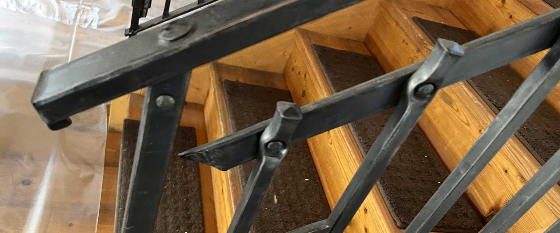 A metal railing on a staircase.